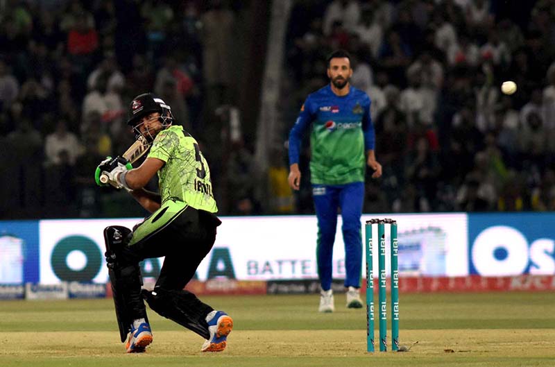 Lahore Qalanders player Abdullah Shafique playing a shot during the Pakistan Super League (PSL 8) Twenty20 Final cricket match between Multan Sultan and Lahore Qalanders at the Gaddafi Cricket Stadium