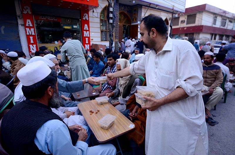 Affluent people of the city are arranging food for breaking fast on Iftar time for deserving people near the old emergency gate of Lady Reading Hospital