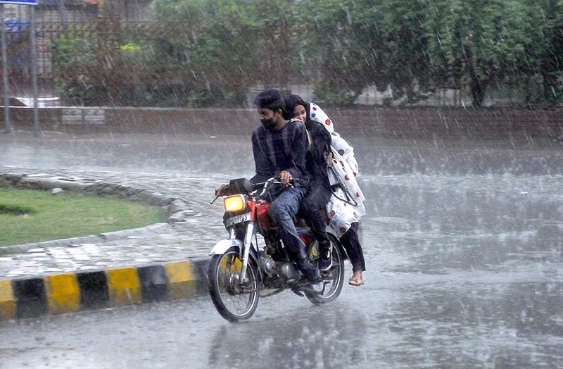 Vehicles on the way during heavy rain in the City