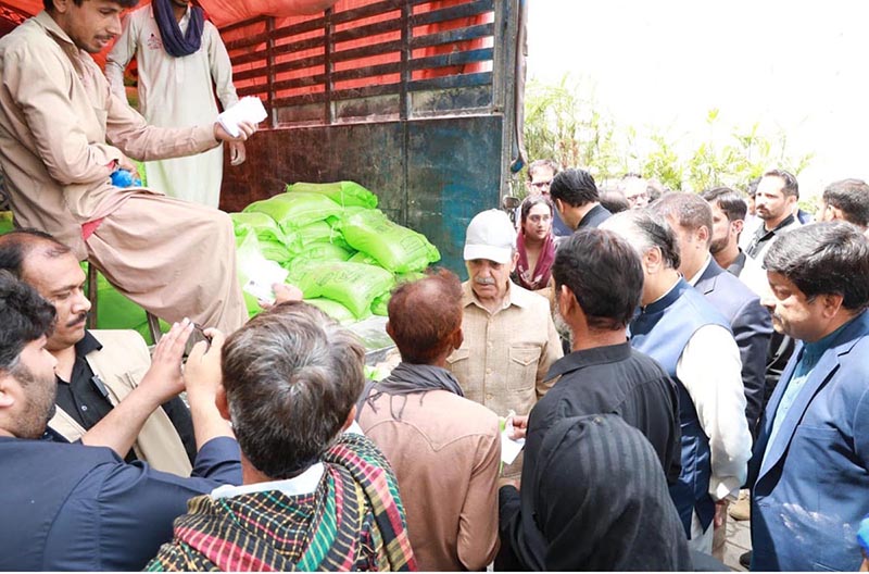 Prime Minister Muhammad Shehbaz Sharif distributes free Atta (Flour) among the beneficiaries of Free Atta Scheme