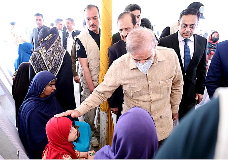 Prime Minister Muhammad Shehbaz Sharif visits free flour distribution points established under PM's Ramzan Package for deserving families