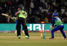Lahore Qalanders player Sikandar Raza bowled out Khushdil Shah during the Pakistan Super League (PSL 8) Twenty20 Final cricket match between Multan Sultan and Lahore Qalanders at the Gaddafi Cricket Stadium