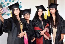 Students taking their selfie with mobile during first convocation of Shaheed Mohtarma Benazir Bhutto Government College of Education