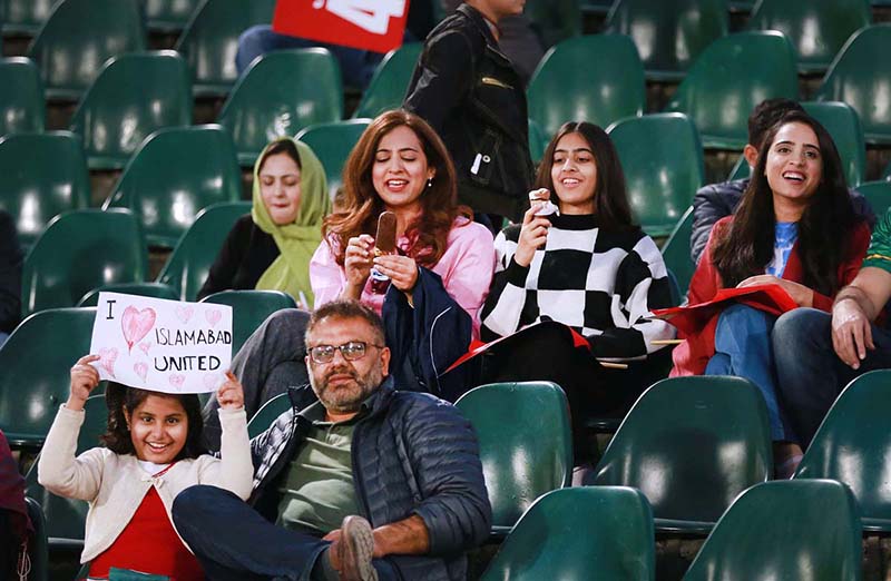 Spectators enjoying cricket match between Islamabad United and Karachi Kings teams during PSL 8 T20 cricket match at Rawalpindi Cricket Stadium