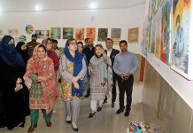 Additional Deputy Commissioner, Sumaira Rabbani and Director Museum, Mohammed Zubair Rabbani viewing the ART Exhibition regarding Women’s Day at Arts Council Museum