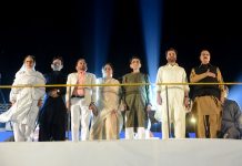 Convener Muttahida Qaumi Movement Pakistan Khalid Maqbool Siddiqui with others leaders standing in respect of national anthem on the occasion of 39 Youm -e-Tasis at Bagh-e-Jinnah