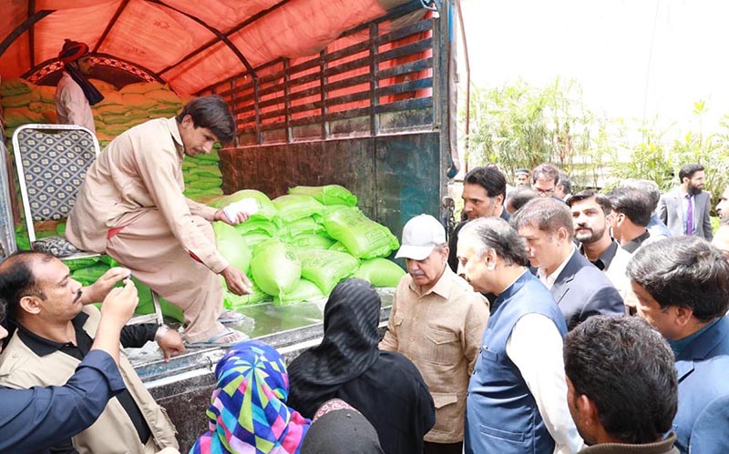 Prime Minister Muhammad Shehbaz Sharif distributes free Atta (Flour) among the beneficiaries of Free Atta Scheme