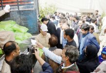 Prime Minister Muhammad Shehbaz Sharif distributes free Atta (Flour) among the beneficiaries of Free Atta Scheme