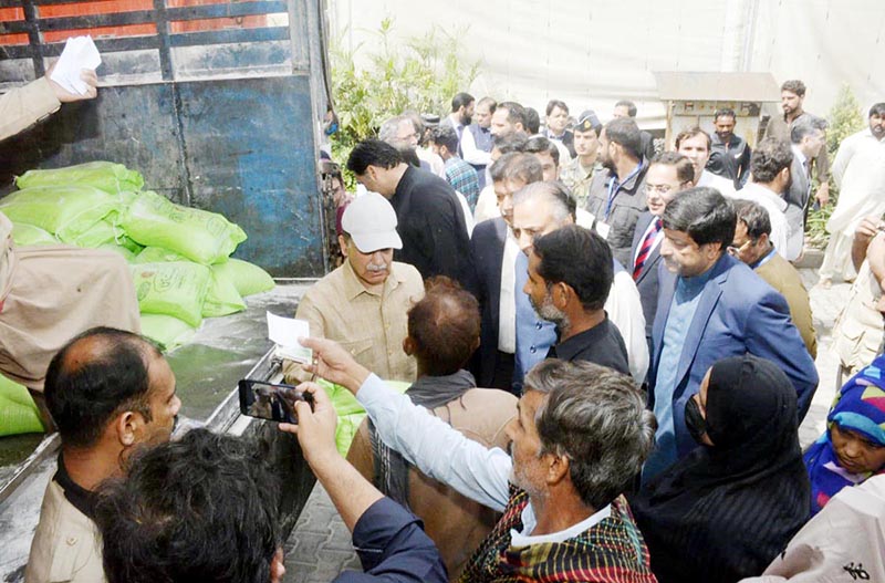 Prime Minister Muhammad Shehbaz Sharif distributes free Atta (Flour) among the beneficiaries of Free Atta Scheme