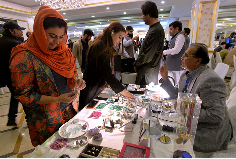 Visitors visiting different stalls during 24th Pakistan Gems, Jewellery and Minerals Show at a local Hotel