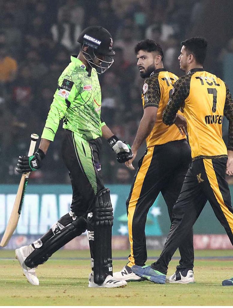 Lahore Qalanders player Shaheen Afridi and David Wiese celebrated after won the match during the Pakistan Super League (PSL) Twenty20 cricket match between Peshawar Zalmi and Lahore Qalanders at the Gaddafi Cricket Stadium