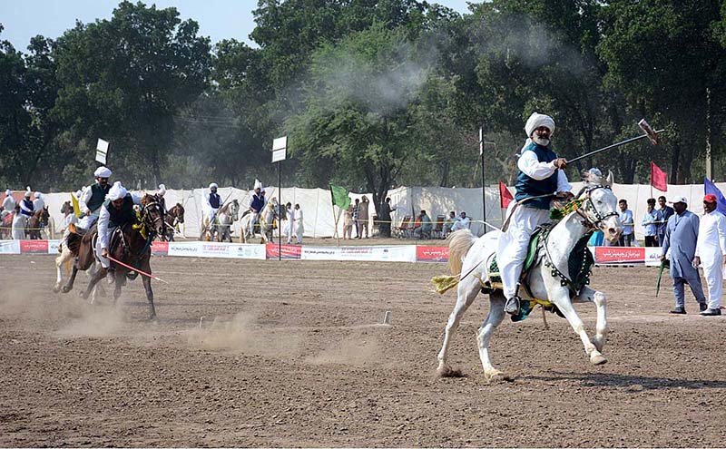 Players in action during last day of tent pegging championship organized by University of Agriculture Faisalabad (UAF) at its Sports Ground in connection with Spring Festival celebrations