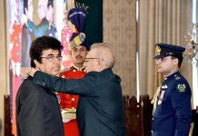 President Dr. Arif Alvi conferring the Pakistan Civil Award of Hilal-i-Imtiaz upon Engr. Prof. Ahmad Farooq Bazai in recognition of his services in the field of Education at the Investiture Ceremony on Pakistan Day, held at Aiwan-e-Sadr