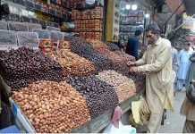 Vendors are busy in arranging and displaying different kinds of dates for selling on the arrival of Holy Month Ramadan in the city