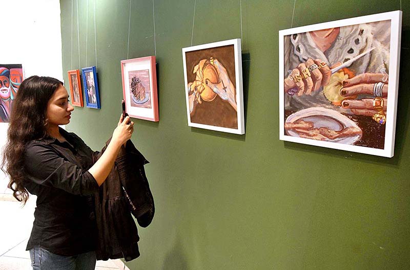 Visitor viewing the painting and different Arts work during Painting and Art Exhibition "Introspective Patterns of Interpersonal Relations" at Alhamra