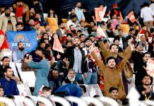 Spectators enjoying cricket match between Islamabad United and Karachi Kings teams during PSL 8 T20 cricket match at Rawalpindi Cricket Stadium