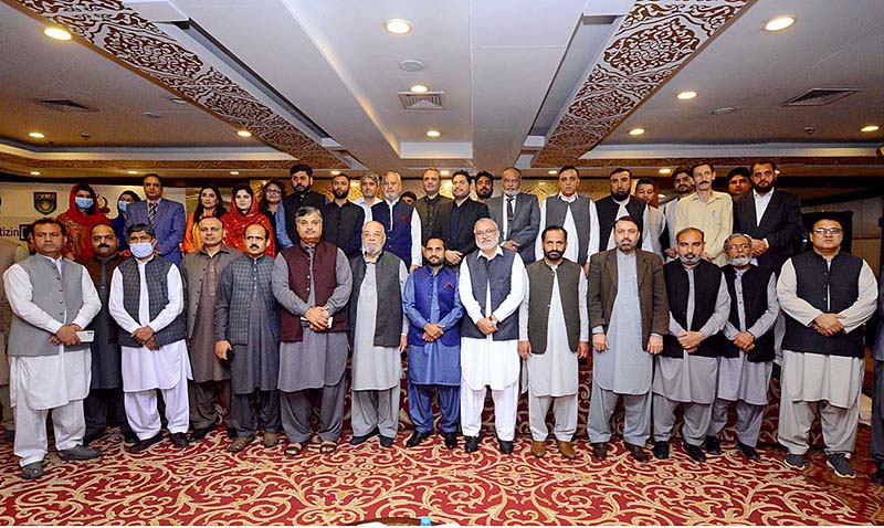 Minister for Food and Irrigation KP, Fazal Elahi, National Program Manager Nutrition International, Zameer Haider and Provincial Program Manager Nutrition International KP, Imtiaz Ali Shah in a group photo with others during a workshop on Edible Oil Fortification