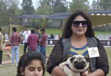 Family along with their Dogs during the International All-breed Championship Dog Show organized by Canine Union Pakistan at F9 Park