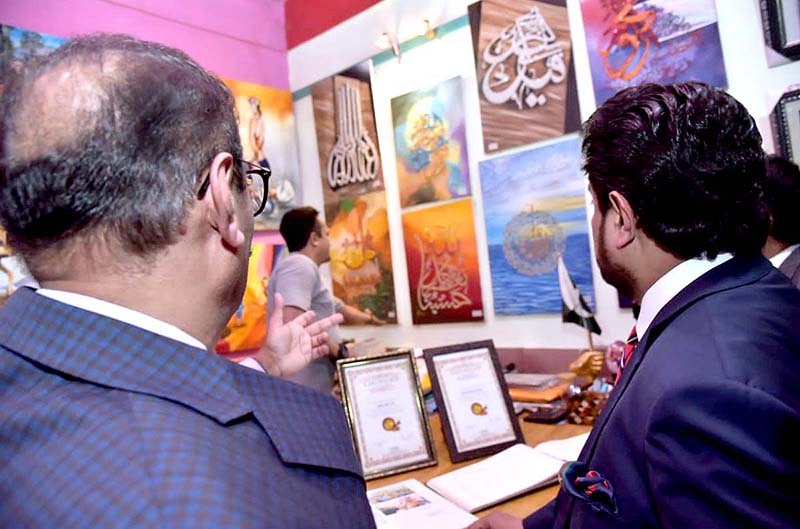 Governor of Sindh Kamran Tassori viewing paintings made by the prisoners of Fine Arts Center at Karachi Central Jail