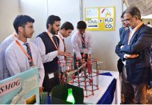 Adviser to PM on Kashmir and Gilgit-Baltistan Qamar Zaman Kaira visits various stalls during the science fair exhibition held at FC College and appreciated the technical skills of students