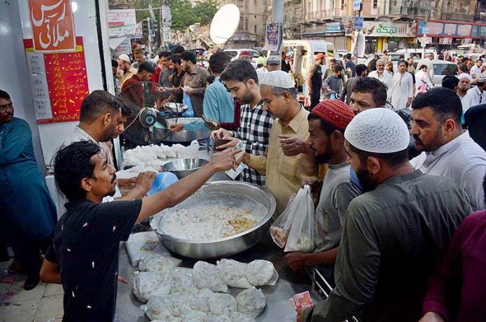 People busy in purchasing food items for Iftari on first day of holy month of Ramzan