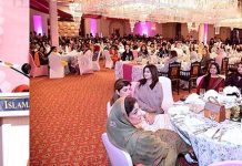 First Lady Begum Samina Arif Alvi addressing an event to commemorate International Women's Day