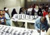 Bodies of victims died in the incident of a stampede in which 11 people including women and children were killed during the distribution of zakat and ration near Nurus Chowrangi in the Sindh Industrial and Trading Estate (SITE) area