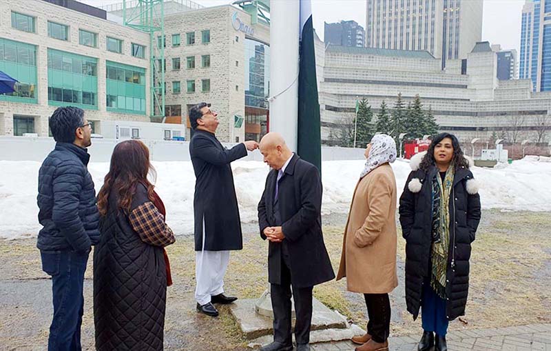 High Commissioner of Pakistan to Canada, Zaheer A. Janjua hoisting the National Flag at the historical City Hall in Canadian Capital Ottawa on the Pakistan Day. Canadian parliamentarians of Pakistani origin Senator Salma Attaullah Jan, MP Salma Zahid, MP Iqra Khalid, MP Yasir Naqvi, MP Paul Chiang and MP Samir Zuberi are present among others