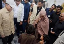 Prime Minister Muhammad Shehbaz Sharif interacts with the beneficiaries of Free Atta Scheme