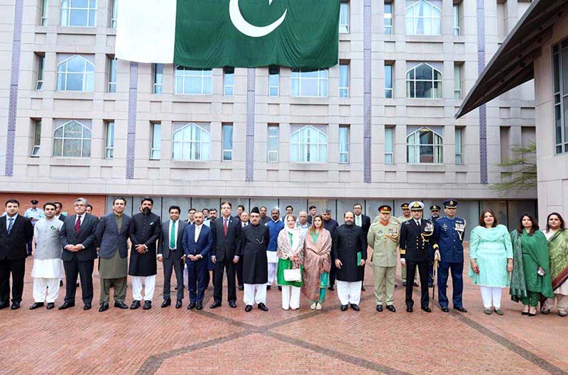 The Officers and officials of Embassy of Pakistan, Washington DC during flag hoisting ceremony on Pakistan Day