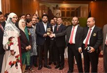 Administrator Karachi Dr. Saifur Rehman presenting the commemorative shield of Karachi Games to Governor Sindh Kamran Khan Tesori in a ceremony organized at Governor House