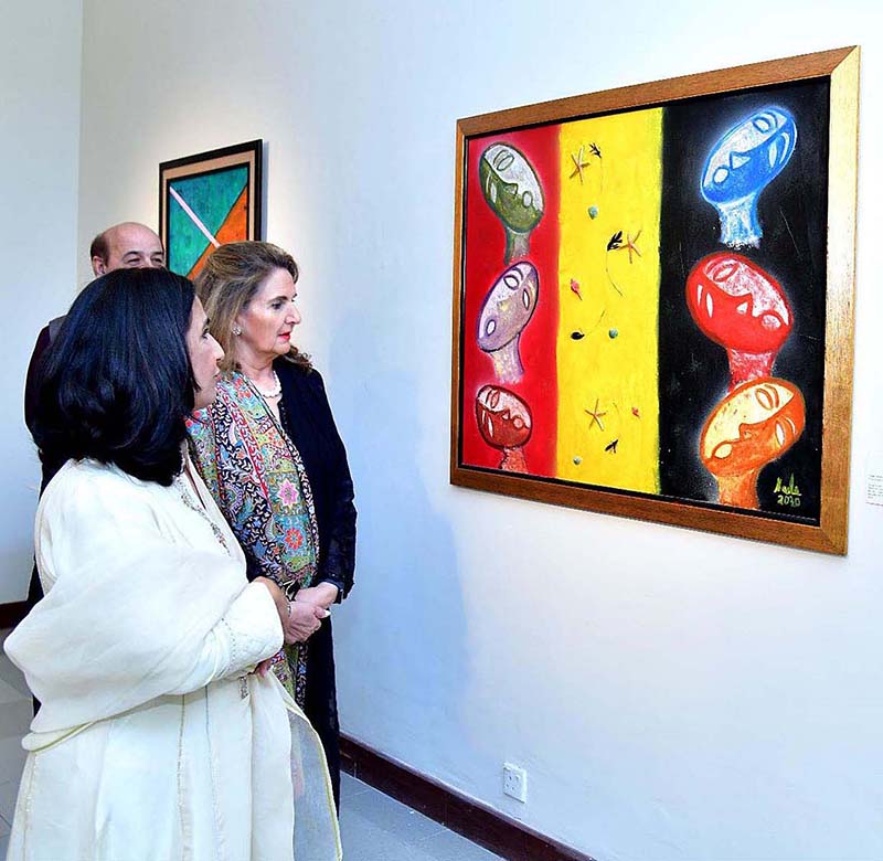 First Lady Begum Samina Arif Alvi viewing the art works on display at the solo painting exhibition of the Former Ambassador, Naela Chohan, at Pakistan National Council of Arts. The art works are aimed at creating awareness about Breast Cancer, Mental Health issues, Gender Equality and the Suffering of the Women of the Indian Illegally Occupied Jammu and Kashmir