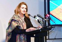 First Lady Begum Samina Arif Alvi addressing the inauguration ceremony of a solo painting exhibition by the Former Ambassador, Naela Chohan, in connection with International Women's Day, at Pakistan National Council of Arts