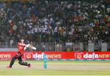 A batsman of Lahore Qalander hitting a ball with his full force between Lahore Qalandars and Islamabad United teams during PSL 8 at Pindi Cricket Stadium in twin cities