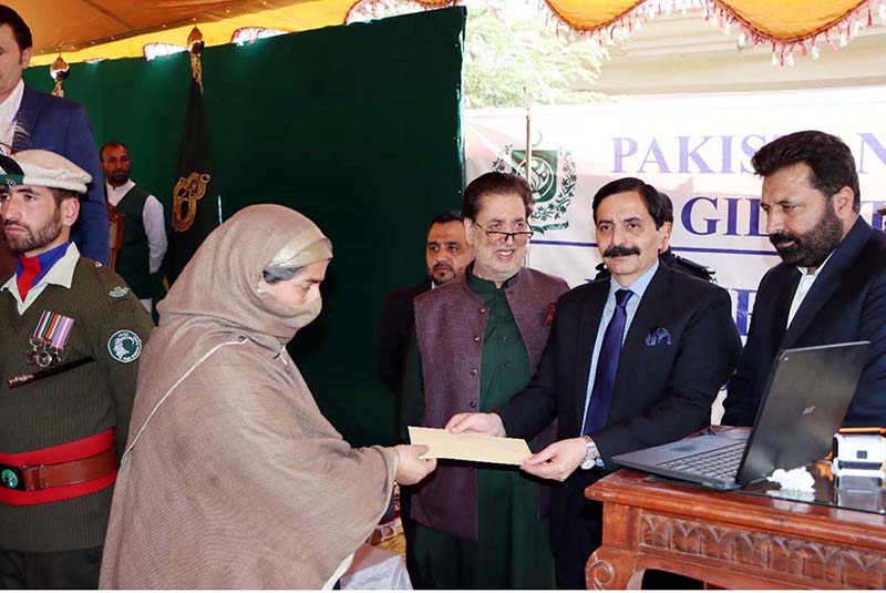 In the presence of Governor Gilgit-Baltistan Syed Mehdi Shah, Managing Director Pakistan Bait-ul-Mal, Amir Fida Paracha giving away the initial payment to a deserving widow under “Orphans and Widows Support Programme”