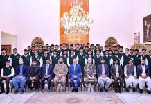 President Dr. Arif Alvi in a group photo with a delegation of students and staff of the Cadet College, Jaffarabad, Balochistan, who called on him, at Aiwan-e-Sadr