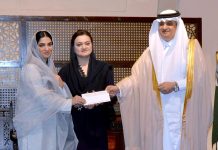 Federal Minister for Information and Broadcasting Marriyum Aurangzeb and Nawaf bin Said Al-Malki, Saudi ambassador to Pakistan giving Saudi Arab Air tickets to winner of videography competition