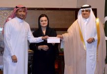 Federal Minister for Information and Broadcasting Marriyum Aurangzeb and Nawaf bin Said Al-Malki, Saudi ambassador to Pakistan giving Saudi Arab Air tickets to winner of videography competition