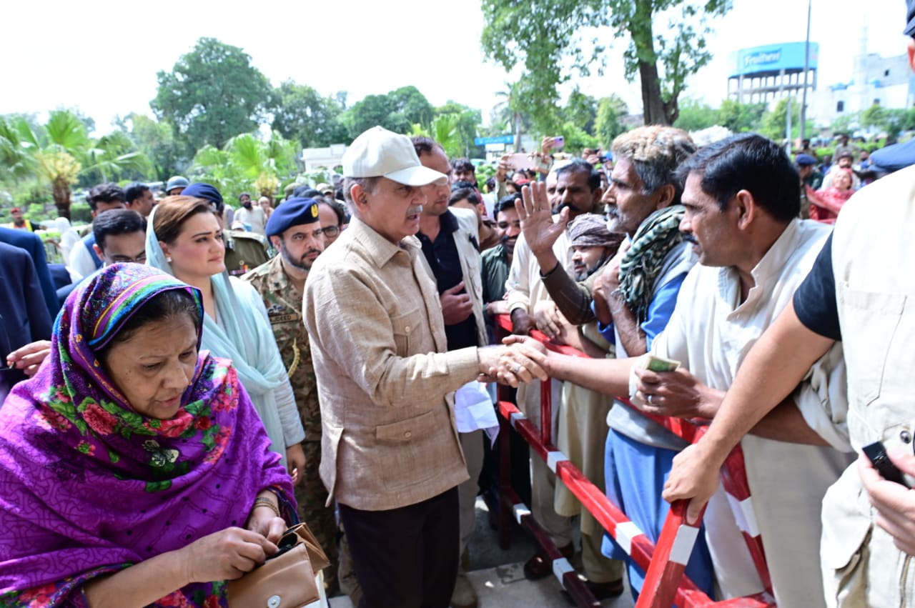 PM visits free flour distribution centers, reviews process