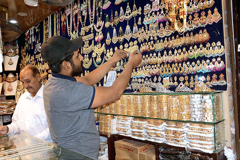 Women busy in purchasing shoes during preparation of upcoming Eid ul Fitr