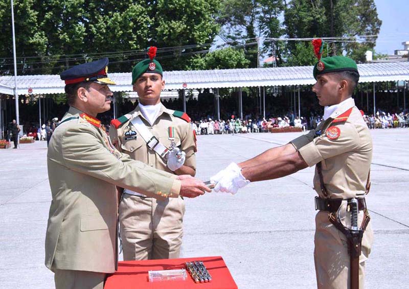 COAS, General Syed Asim Munir, gives award to distinguished cadet during 147th PMA Long Course, 13th Mujahid Course, 66th Integrated Course, 6th Basic Military Training Course and 21st Lady Cadet Course at Pakistan Military Academy (PMA)