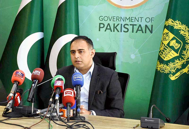 Coordinator to the Prime Minister for Economy and Energy, Bilal Azhar Kayani, addressing a press conference at PTV HQ.