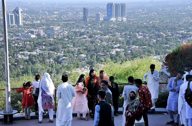 Visitors enjoy bird eye view of the federal capital from the picnic point Daman e Koh to celebrate the 2nd day of Eid ul Fitr