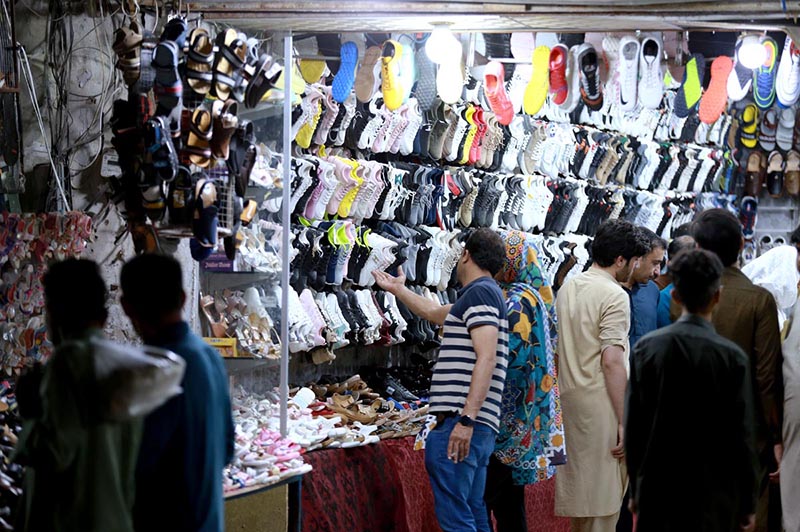 People busy in shopping for upcoming Eid ul Fitr Festival at sadder bazaar.