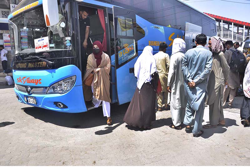 People arrive back to the city after spending Eid ul Fitr holidays in their hometowns