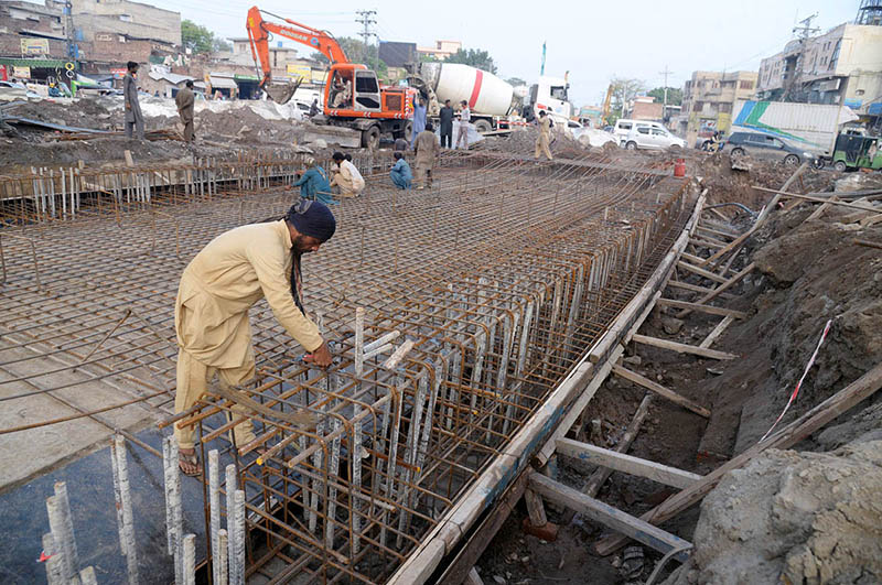 Laboures working at construction work of Sumanabad Underpass.