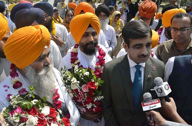 Additional Secretary Rana Shahid Saleem is talking to the media about the arrival of Sikh Yatrees at Wagah Border.