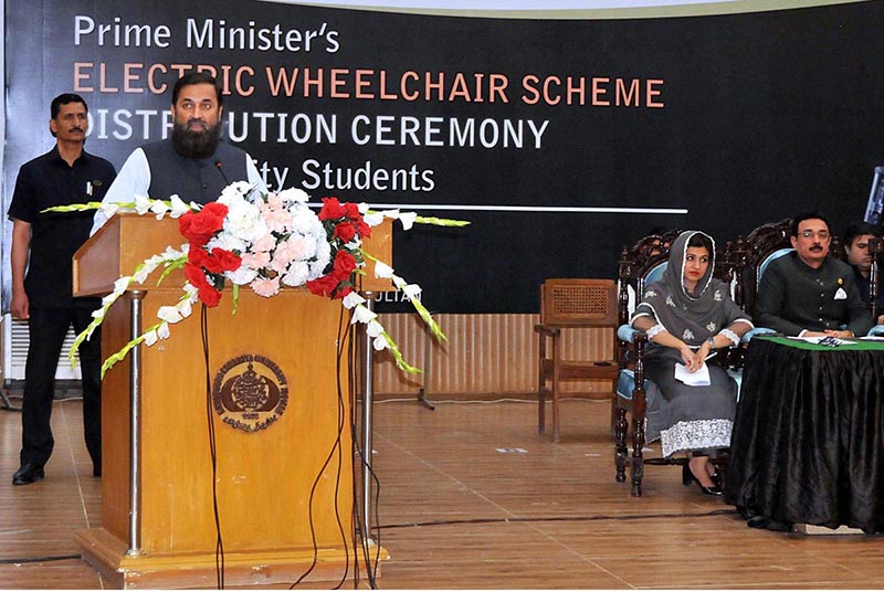 Governor Punjab Baligh ur Rehman addressing during the Prime Minister's electric wheelchair distribution ceremony for university students organized by HEC at Jinnah Auditorium BZU.