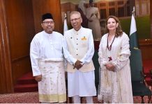 President Dr Arif Alvi exchanging Eid greetings with people from different walks of life, including diplomats, at an Eid Milan event, at Governor House