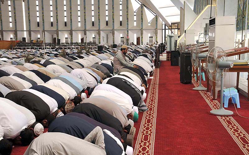 A large number of people offering Namaz-e-Jumma (Friday Prayer) at Faisal Masjid during holy fasting month of Ramzan.